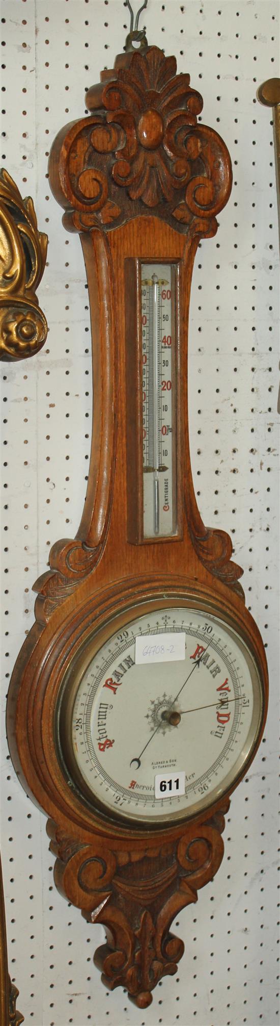 Carved oak barometer